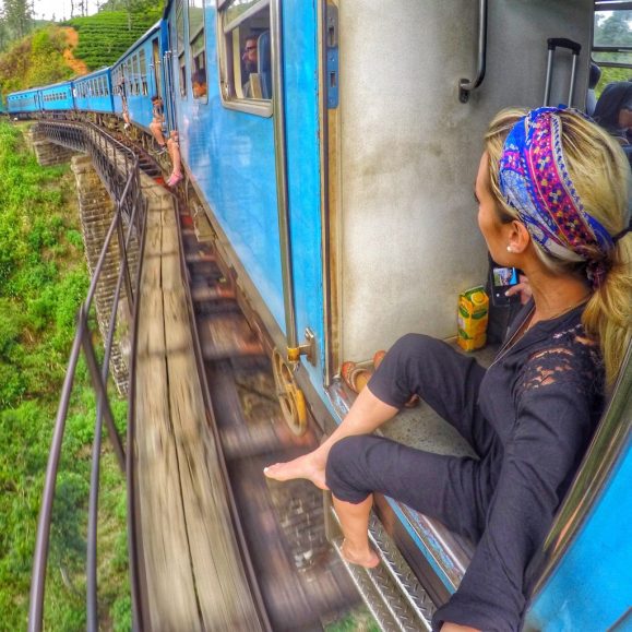 solo traveler girl on a train in sri lanka